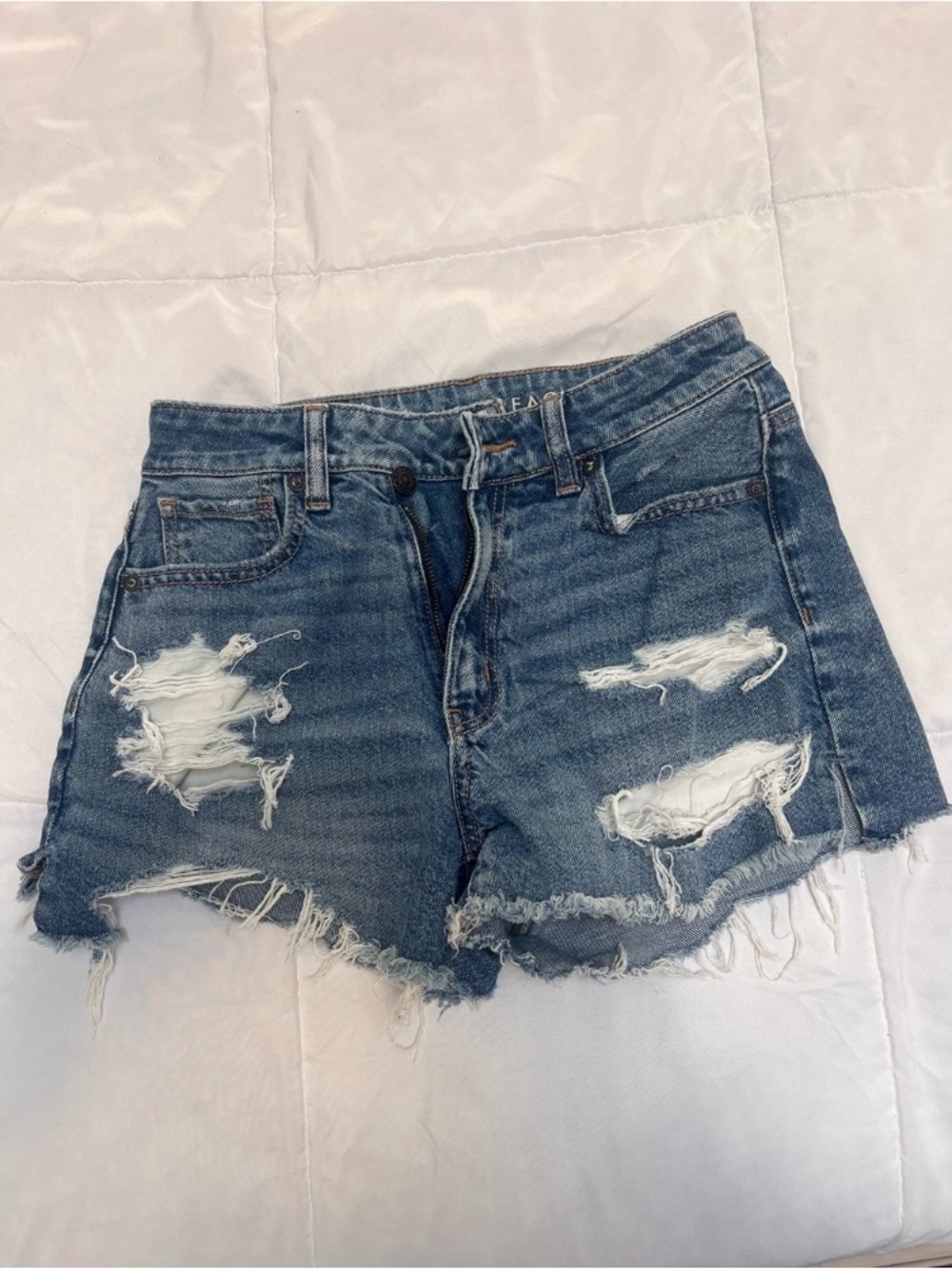 Women’s Distressed Blue Denim Shorts